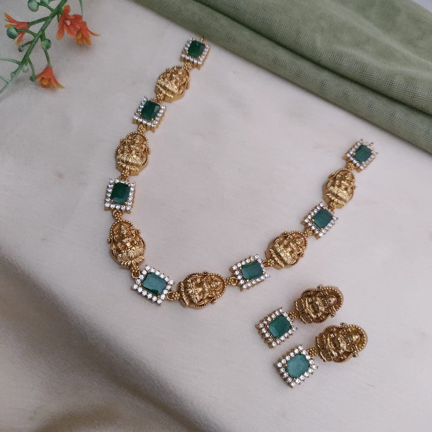 Lakshmi motif with rectangle shaped stone studded necklace set