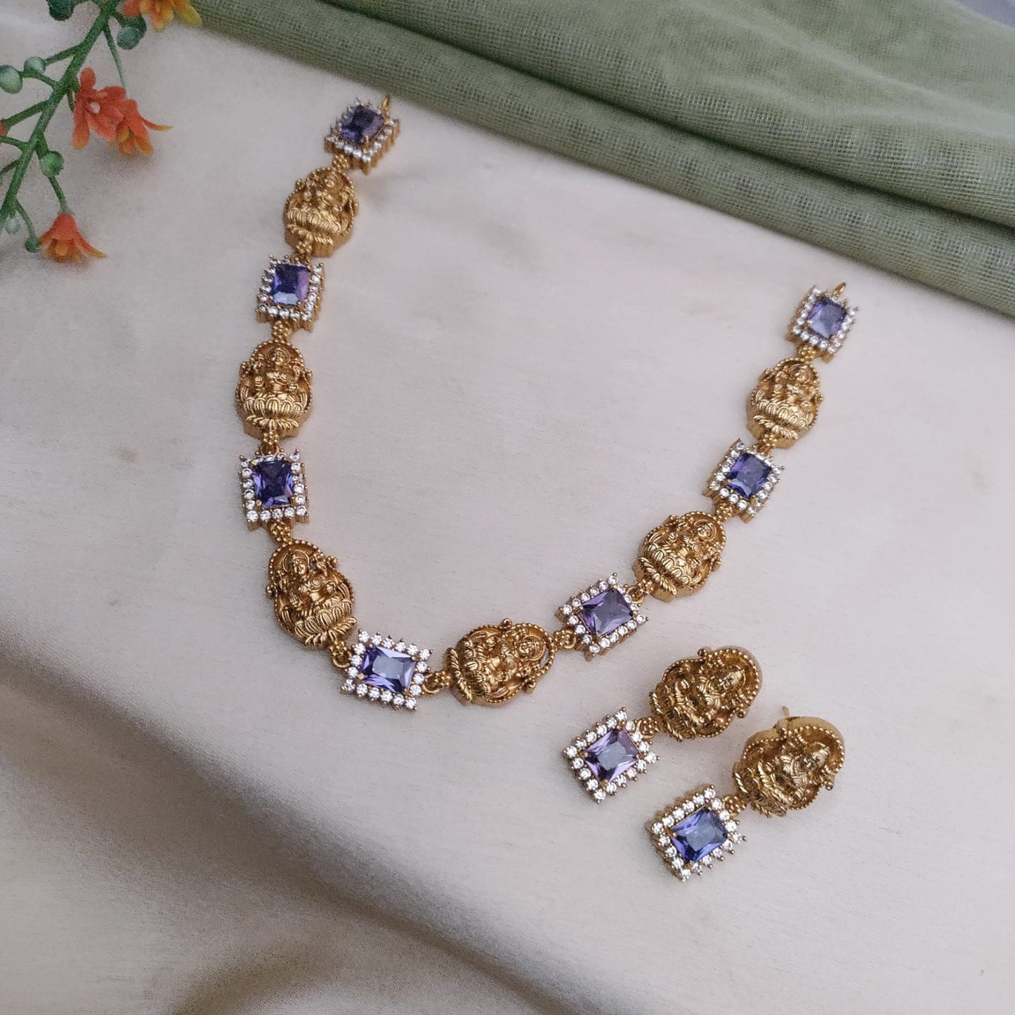 Lakshmi motif with rectangle shaped stone studded necklace set