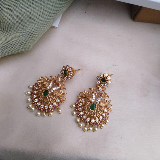 Golden peacock stone earring