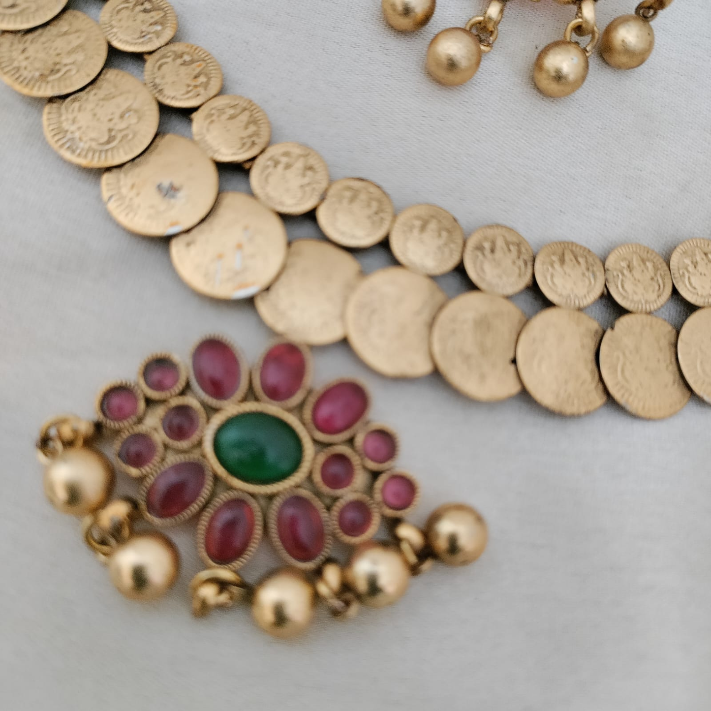 Ruby pendant lakshmi coin necklace