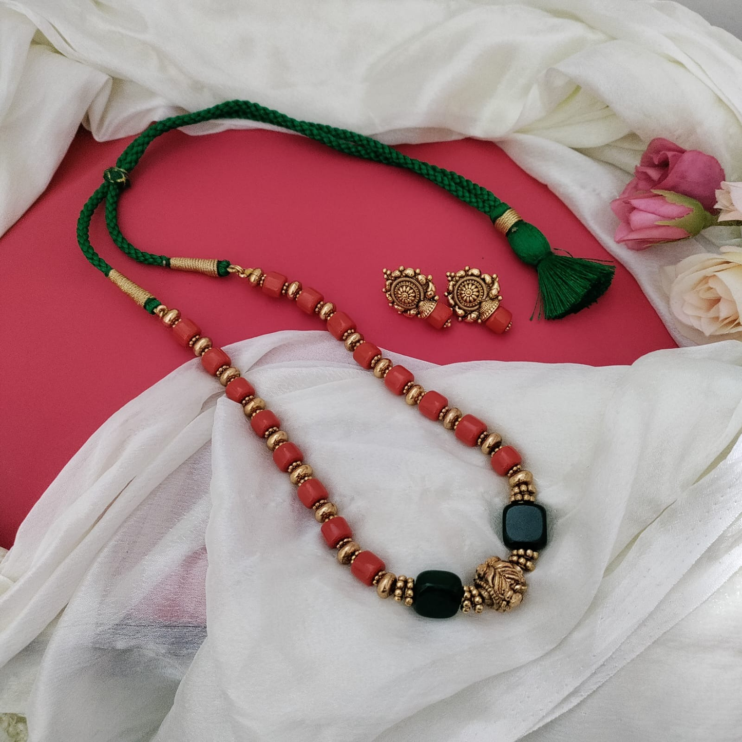 Coral beaded necklace set with Green stone