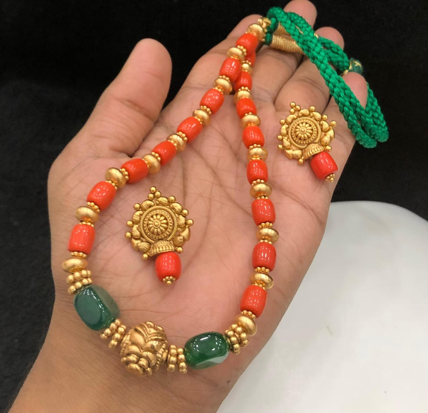 Coral beaded necklace set with Green stone