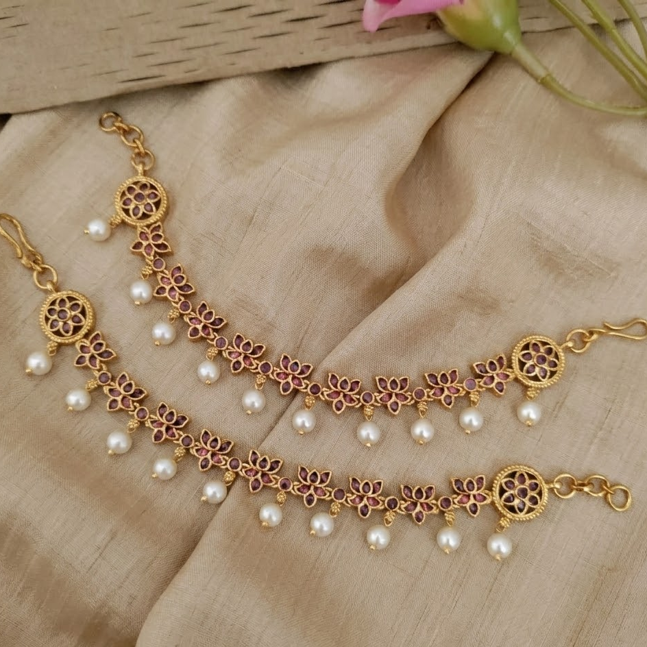 Ruby lotus pearl drop kemp earchain