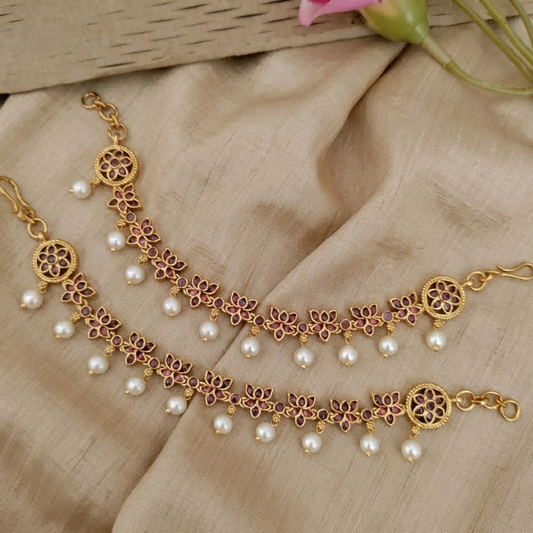 Ruby lotus pearl drop kemp earchain