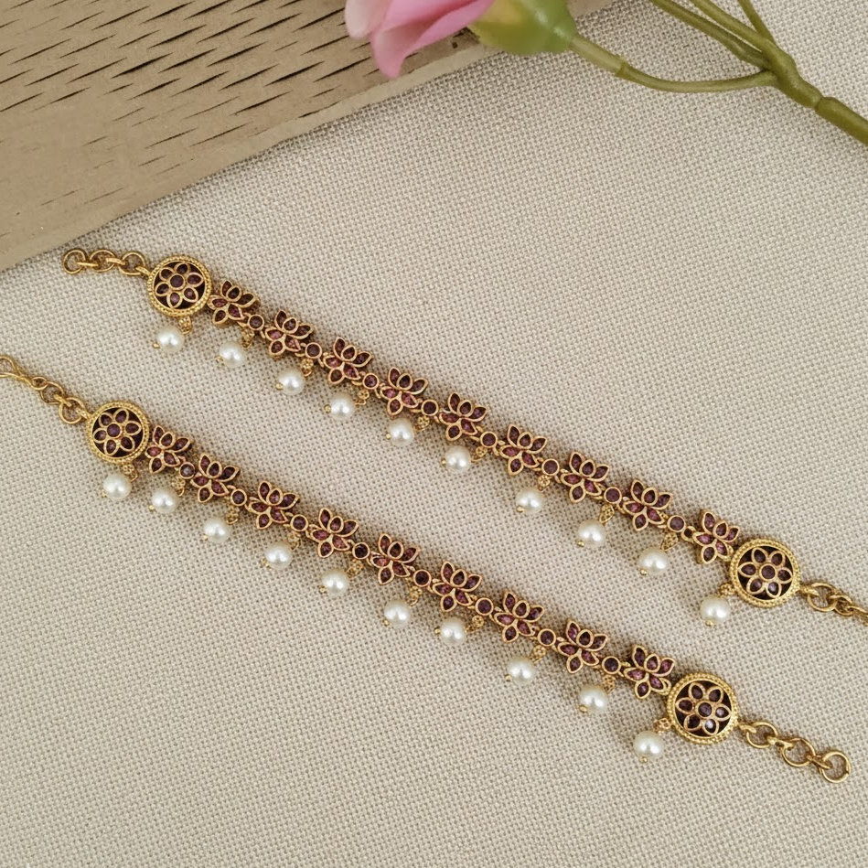 Ruby lotus pearl drop kemp earchain