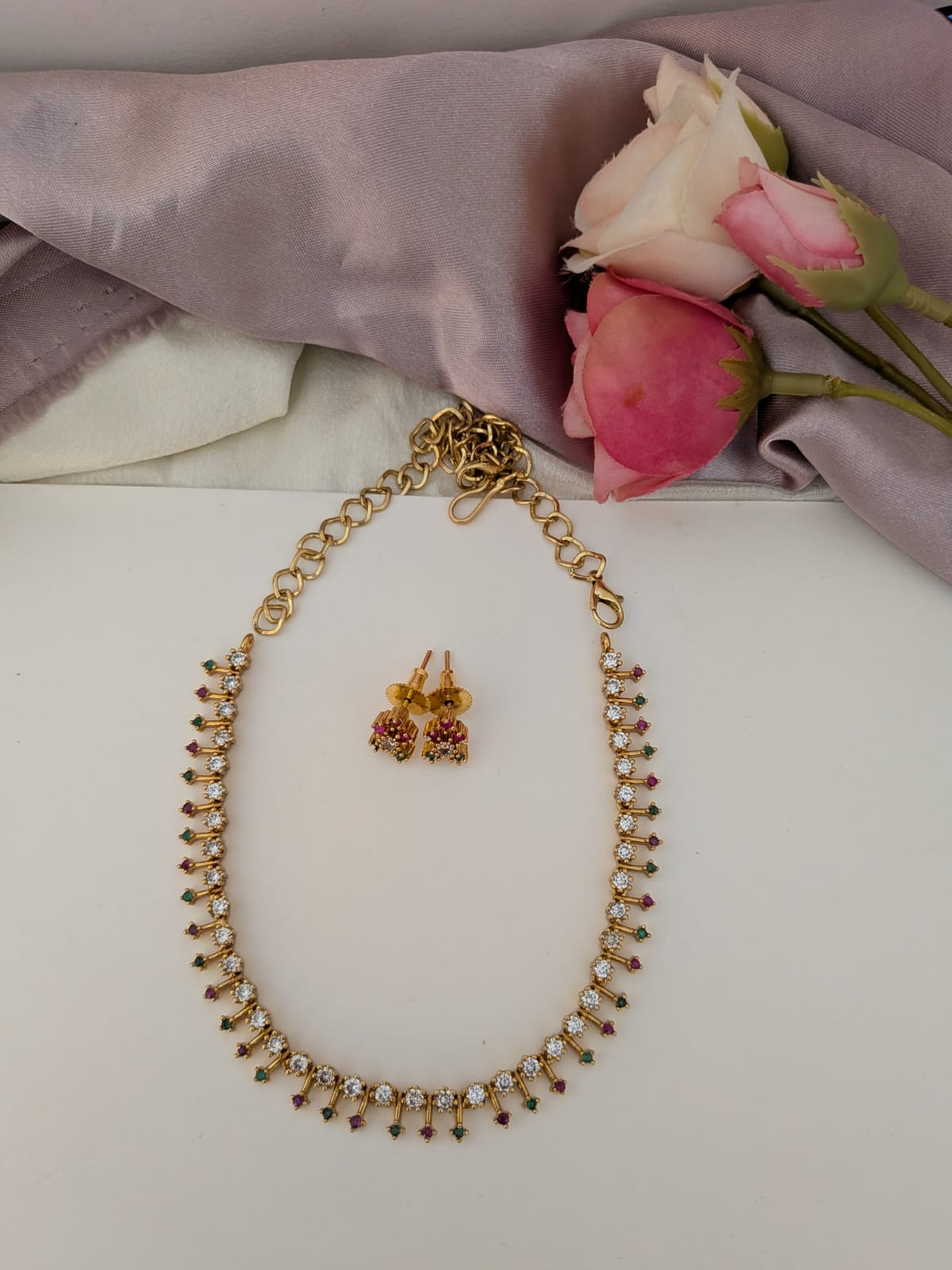 Simple Diamond lookalike sleek neckset in green, white, ruby