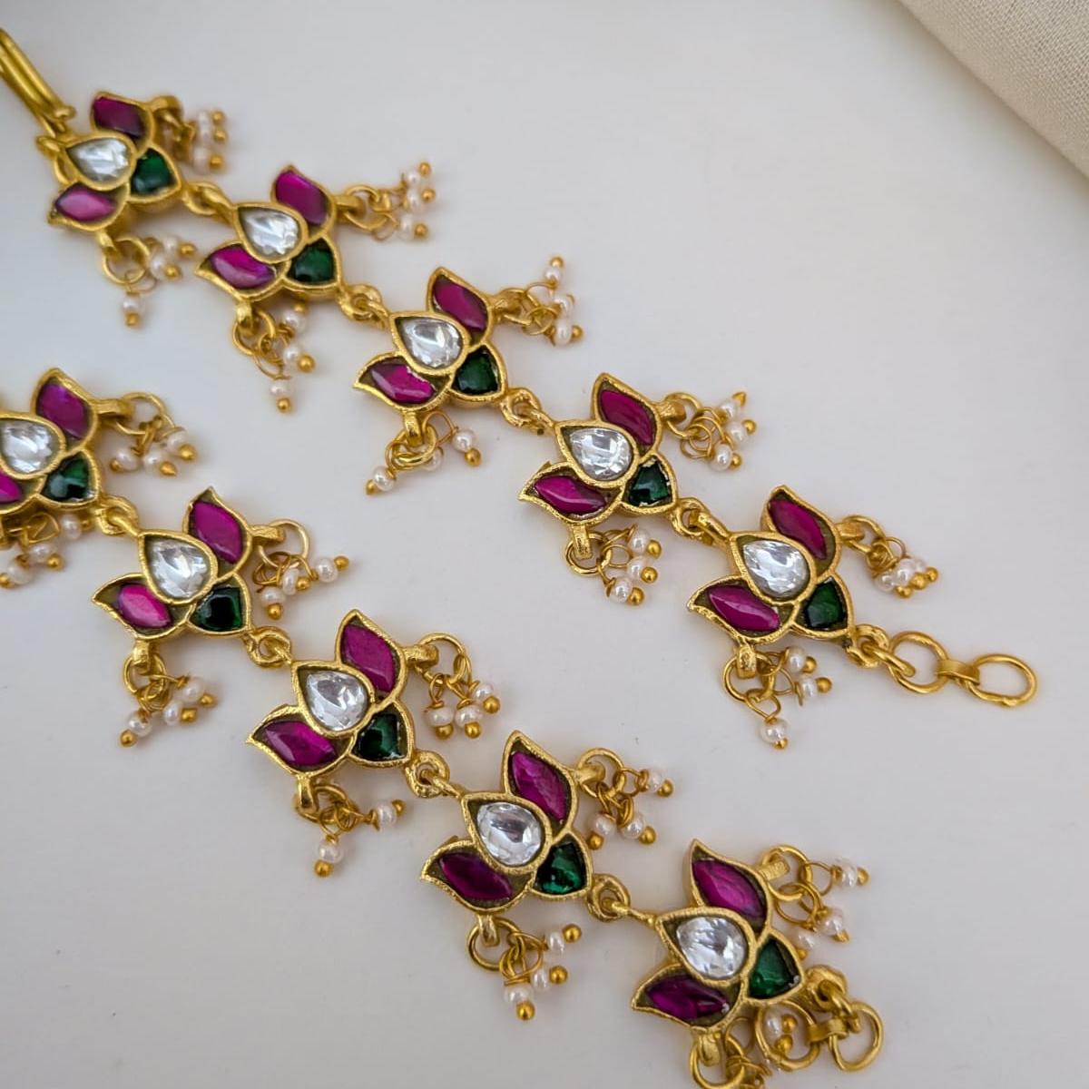 Jadau lotus multi pearl drop earchain
