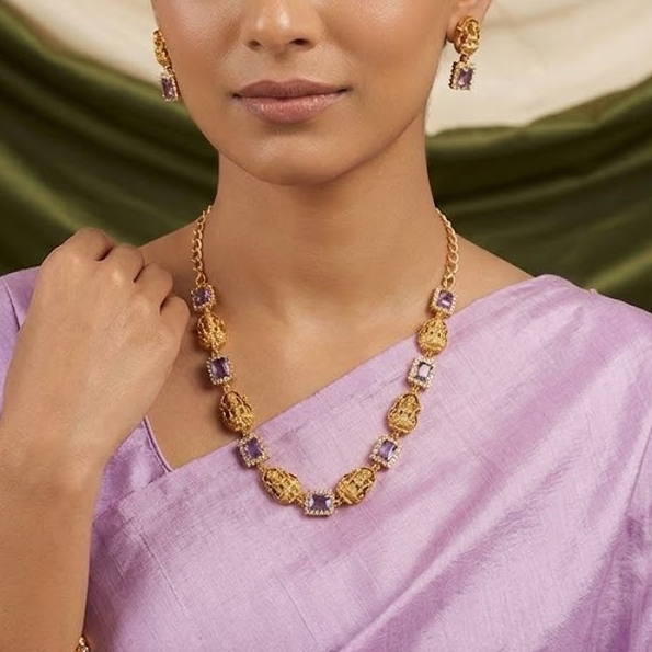 Lakshmi motif with rectangle shaped stone studded necklace set