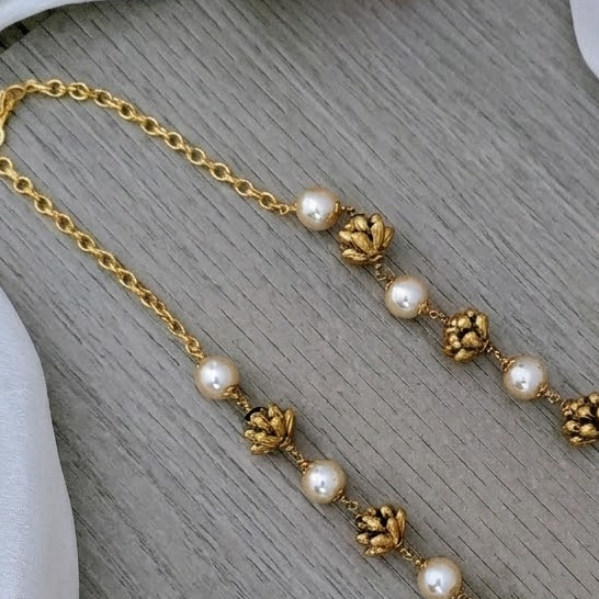 Lotus with pearl antique mala