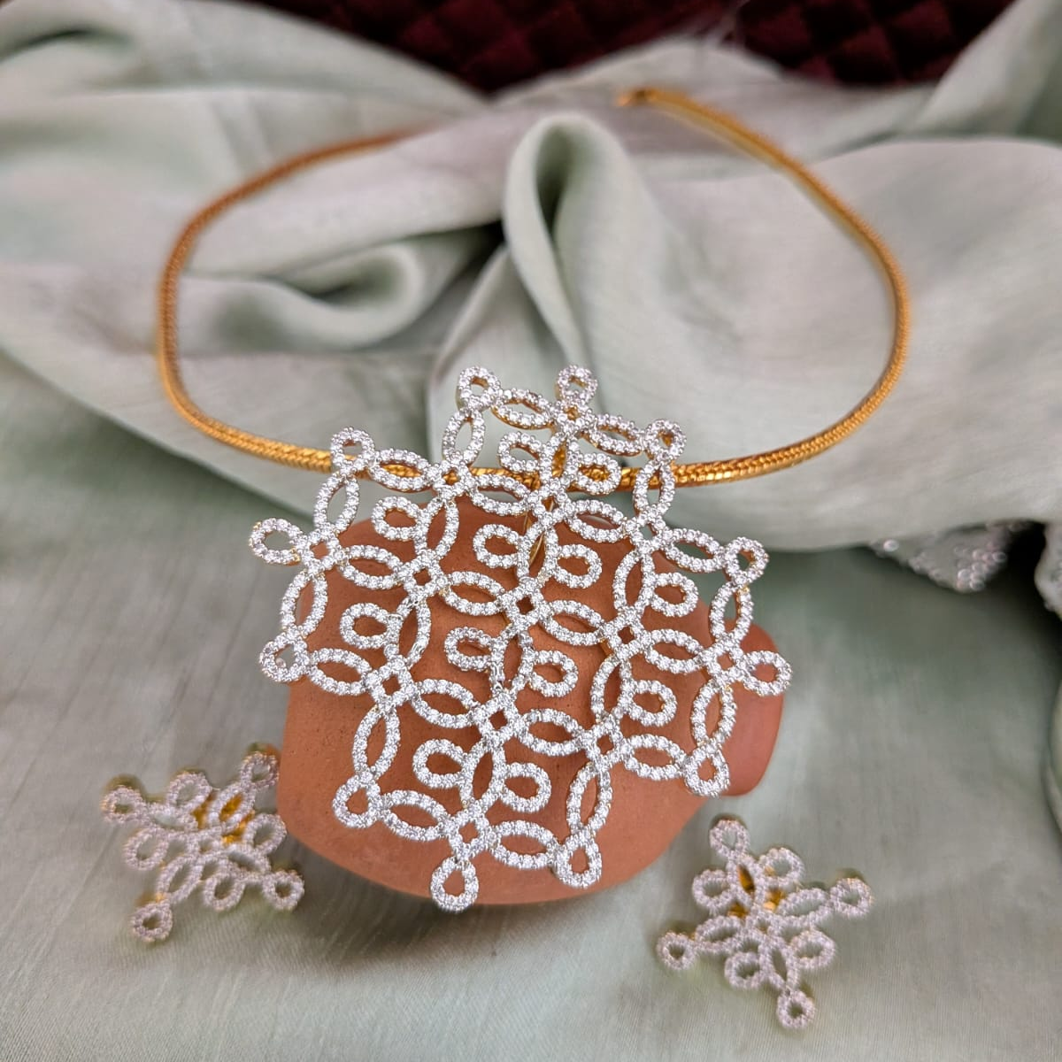 AD Kolam / Rangoli diamond look alike pendant set