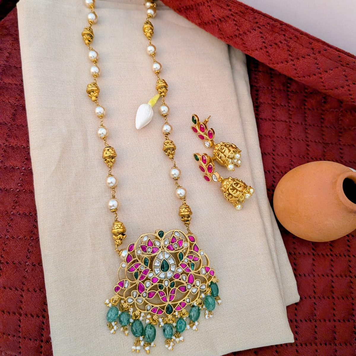 Jadau kundan floral pendant long haram with nakshi work ball