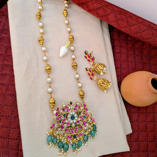 Jadau kundan floral pendant long haram with nakshi work ball